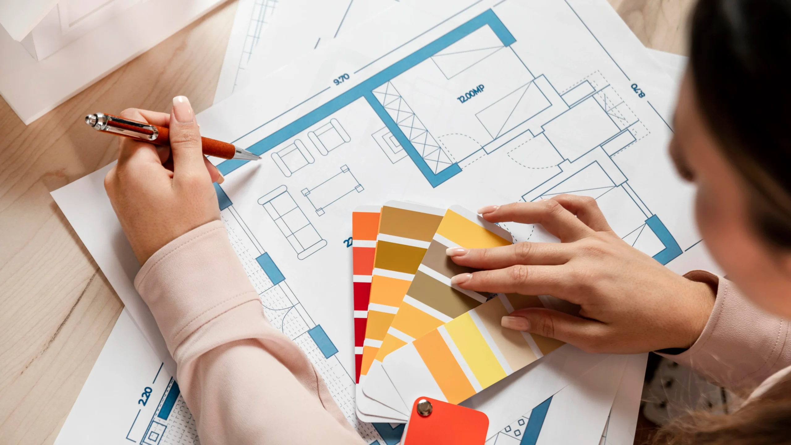 close up of woman with color palette in hand