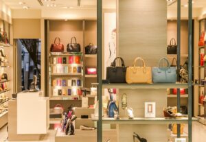 a leather goods boutique with handbags on display
